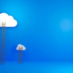 Three clouds with ladders at different heights against a blue background.